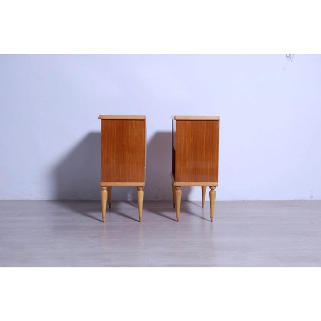 Interesting pair of bedside tables, original production of the '60s and not a remake of today. Slender wooden feet, pair...