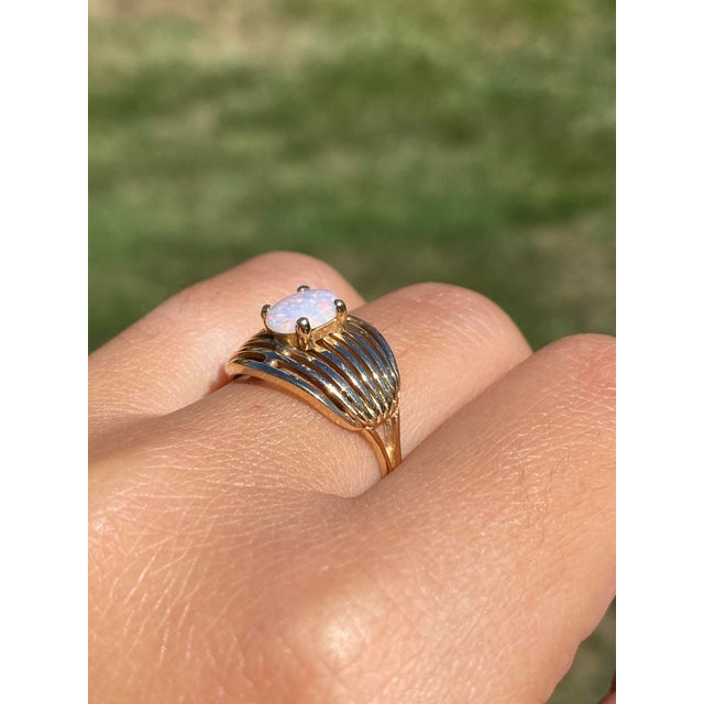 The Braselton: Ladies Vintage 14K Yellow Gold Australian Opal Cocktail Ring. Mid century in style, this cocktail ring...