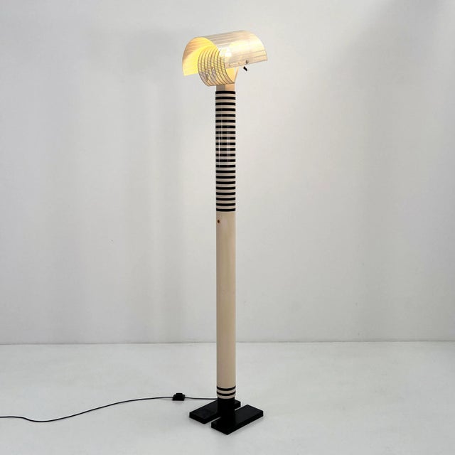 Shogun Floor Lamp by Mario Botta for Artemide, 1980s, in Good conditions. Designed 1980 to 1989 This piece has an...