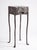 Unique modern accent table entirely hand-forged from solid steel with a deep multi-layered patinated finish. This is not...