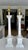 Pair of Large Italian Neoclassical style carved column form alabaster table lamps, featuring elegant fluted shafts and...