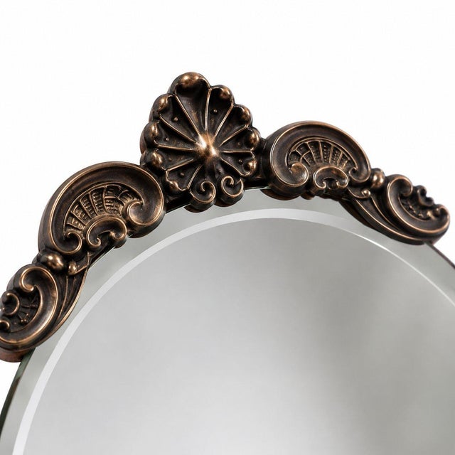 Silver table mirror. 30 cm. 542 grams. This piece is attributed to the mentioned designer/maker. It has no attribution...
