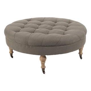 Maison Round Tufted Ottoman in Charcoal with Natural Oak Turned Legs For Sale