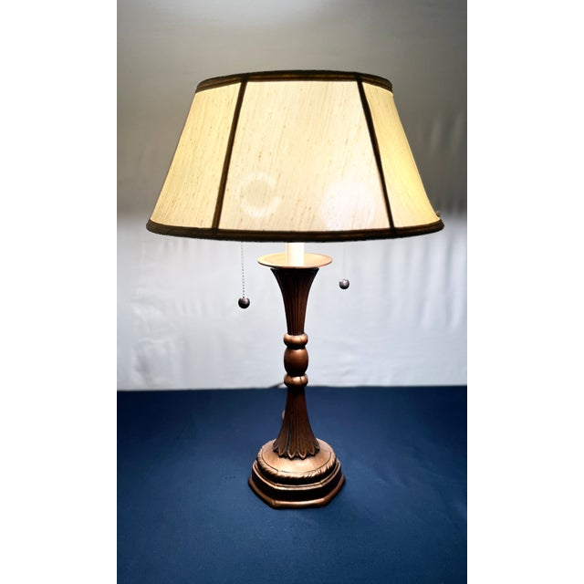 This authentic Stiffel table lamp features a heavy cast metal base in a rich American Bronze finish. The neoclassical...