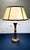 This authentic Stiffel table lamp features a heavy cast metal base in a rich American Bronze finish. The neoclassical...