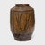 A beautiful example of Chinese folk pottery, this terracotta jar is a 19th-century pickling pot once used for fermenting...