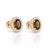 Exude subtle sophistication with these chic smoky topaz oval halo stud earrings. Featuring a rich earthy-brown gemstone...