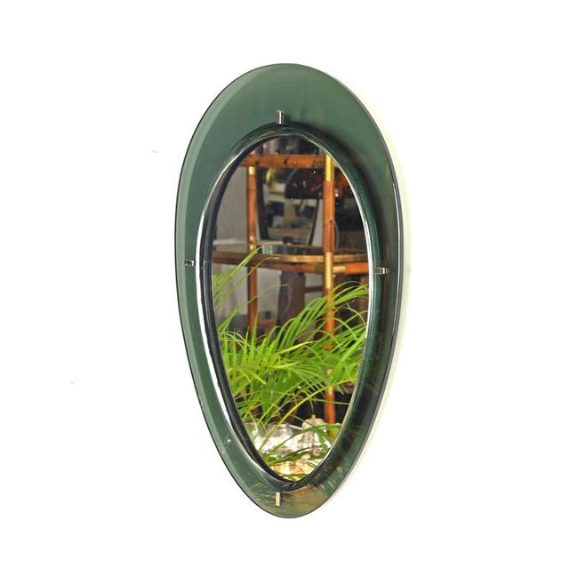 Marvelous large teardrop-shaped beveled mirror with a gorgeous and thick deep olive green beveled crystal frame. This...