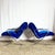 Striking pair of Mid Century Modern lounge chairs featuring sculptural chrome scissor-X frames paired with rich blue...