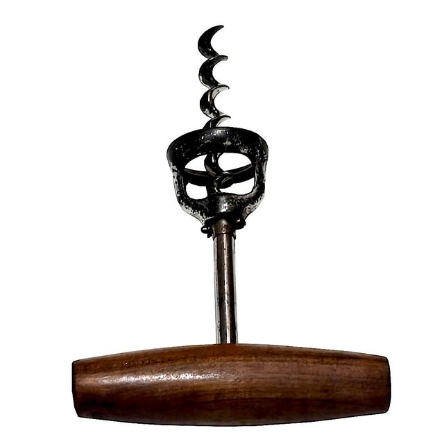 Offered is an early 20th Century patented bell corkscrew with a walnut wood handle. Apparently there are many people...
