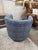 Coastal blue swivel chair by CR Laine.