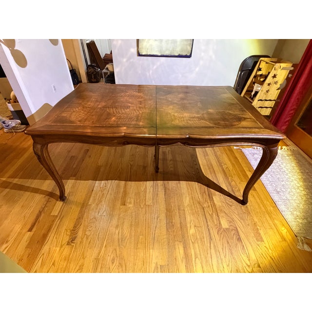 Solid wood 1964 Baker Furniture dining table. French Provincial (Louis XV) style. Has gorgeous cherry legs (cabriole with...