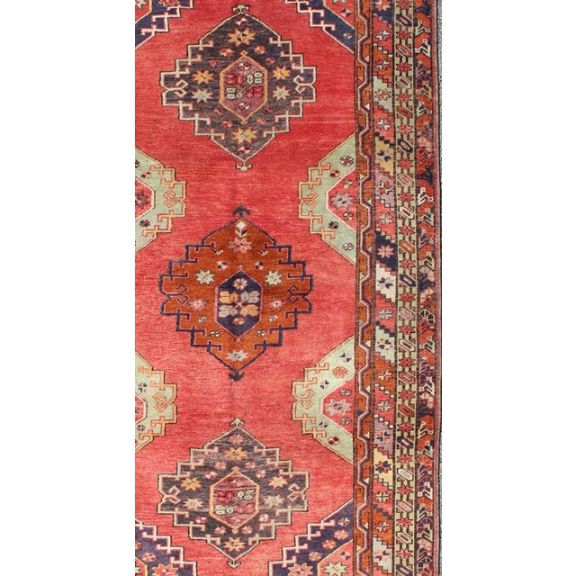 Tribal Red Field Vintage Turkish Oushak Rug With Vertical Geometric Medallions For Sale - Image 3 of 8