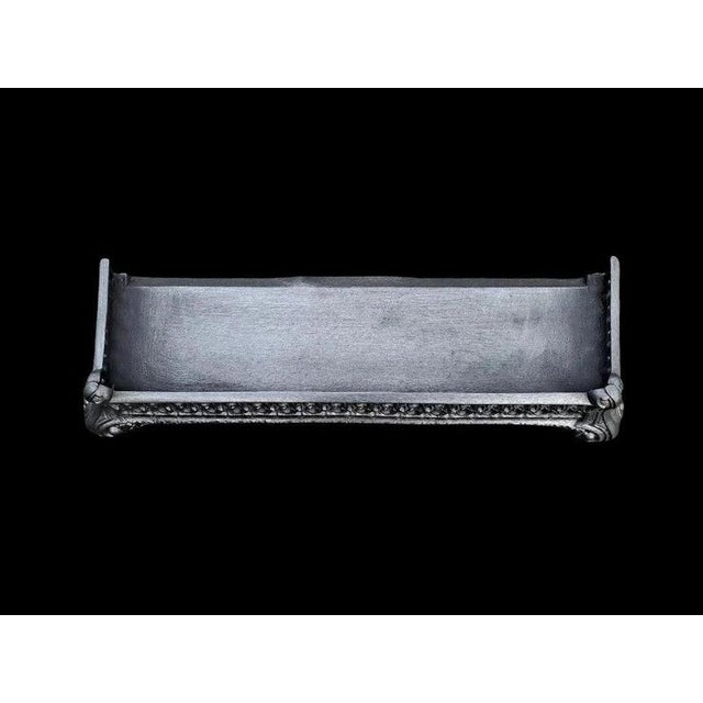 A highly decorative late 19th-century Victorian cast iron fireplace fender, dating to circa 1890 and retaining its...