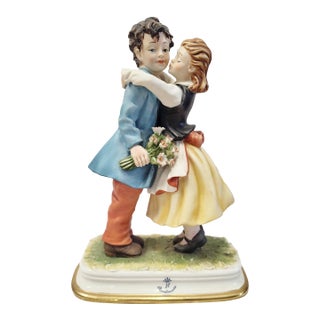 Vintage Italian Ceramic Capodimonte Porcelain Figure Boy & Girl "First Kiss" For Sale