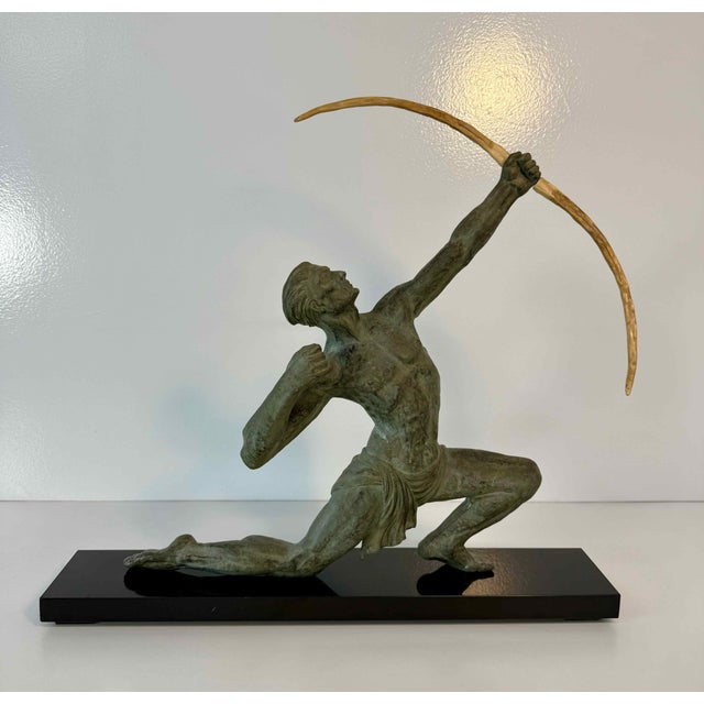 Elegant French Art Deco sculpture depicting an archer, titled “L’ARCHER”, after Jean de Roncourt, made in France circa...