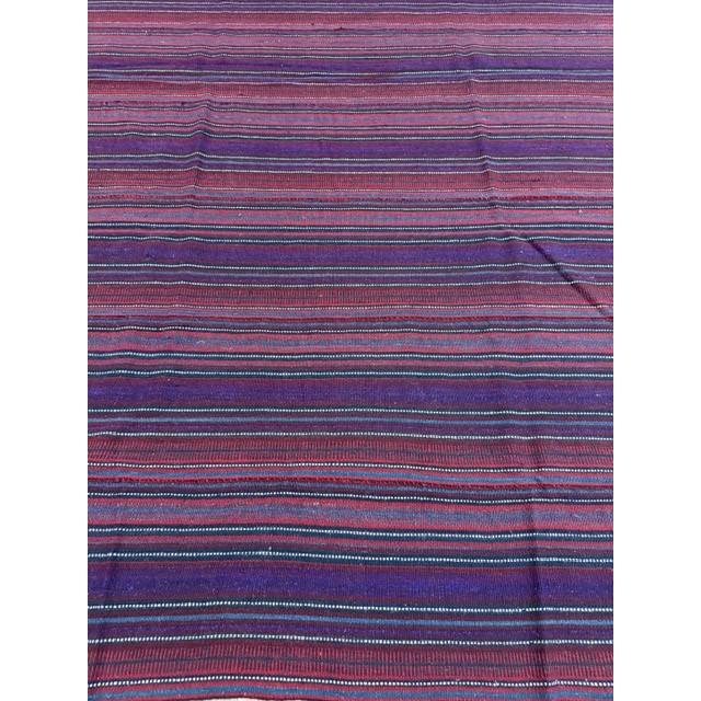 this mid-20th-century Turkish Decorative textile is a beautiful testament to Anatolian tribal weaving craftsmanship....