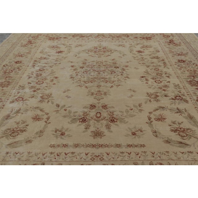 Hand-knotted in wool, this 12x15 rug is inspired by antique English Axminster rugs, reimagined in a playful contemporary...