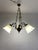 Decorative three-light chandelier sourced in Slovenia and dating approximately from the 1960s–1970s Yugoslav period. The...