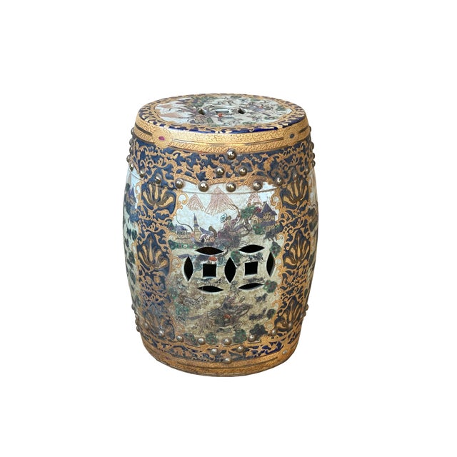 This ornate ceramic garden stool is a striking example of Chinoiserie-style craftsmanship, featuring a traditional barrel...