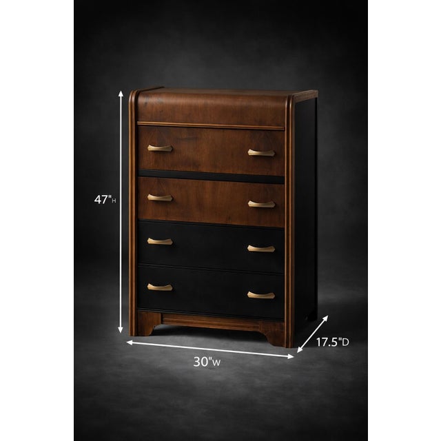 A striking Art Deco waterfall accent chest featuring beautifully grained satin walnut veneer, sculptural original brass...