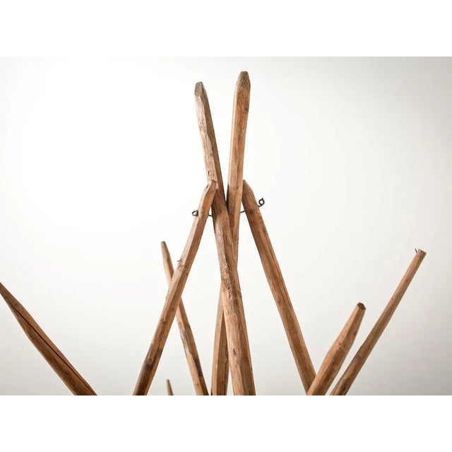 Vintage folding hay drying rack Hand-carved wooden staves Used for drying freshly hand-cut hay in the field Bent wire...