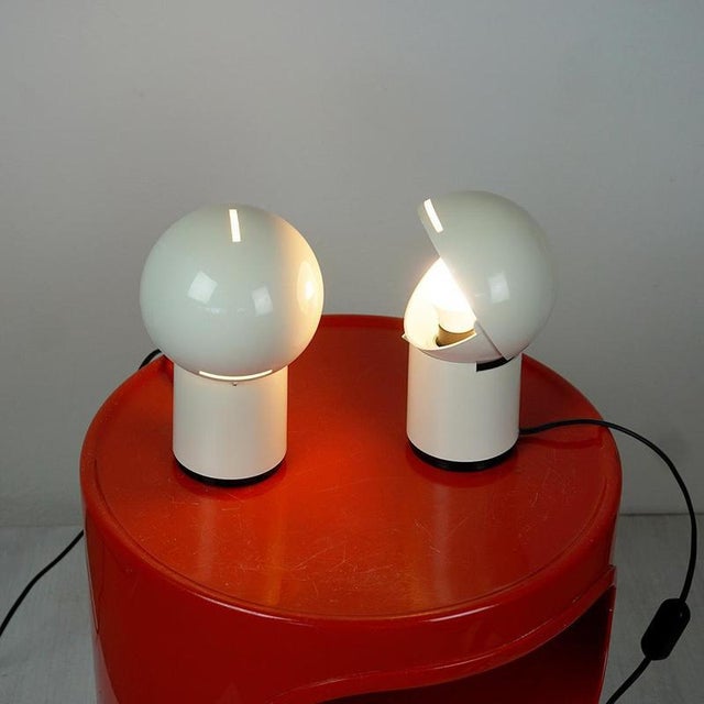 Charming set of white Italian Space Age Asteroidi table lamps, designed by Siberin Caronno Italy 1970s. Thei feature a...