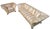 Sofa and armchair set with "elephant tusk" (or saber) legs. A design classic that recalls the colonial style and taste of...