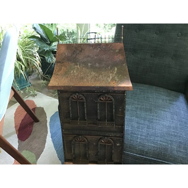 This Curtis Jere vintage signed metal wall sculpture looks like a Parisian street scene and is called “Paris Cafe.” It...