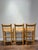 A beautifully crafted set of three Danish Modern style bar stools featuring solid oak frames and handwoven rush seats in...