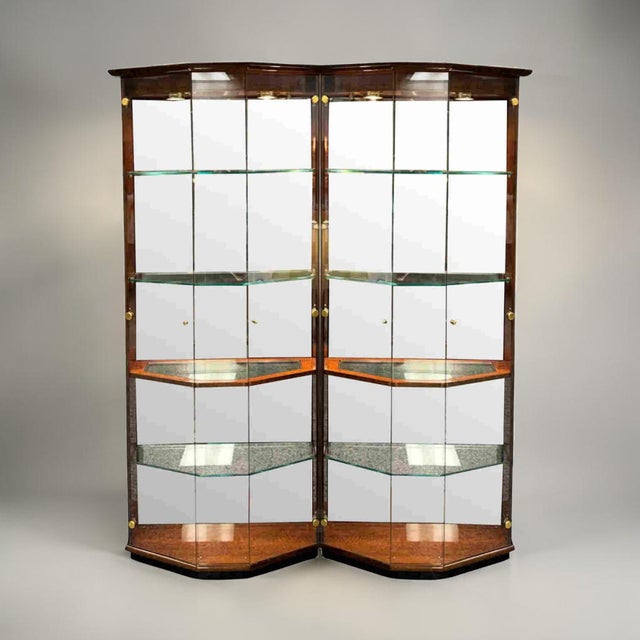 Elevate your interior with this elegant pair of Henredon mahogany bunching curio cabinets, expertly crafted to showcase...