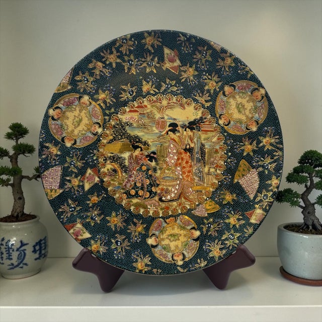 Vintage Japanese Royal Satsuma hand-painted earthenware decorative charger featuring geishas and 24k gold detailing. Plate...