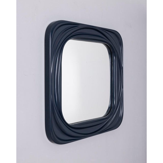 Square wall mirror with decorated blue plastic frame, Italian design, 1970s.