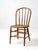 Early 20th century Windsor bow back chair with a warm mustard painted finish and a classic farmhouse silhouette. The...