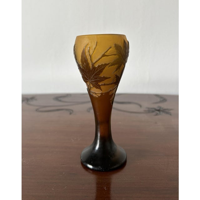An elegant Art Nouveau cameo glass vase, designed by the celebrated master glassmaker Émile Gallé and crafted by his...