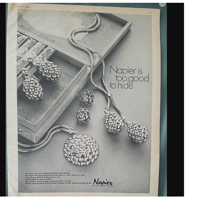 1968 3d goldtone thistle with leaf brooch with security clasp. Marked "NAPIER©" on the back. Measures: 3 1/4 inches long...