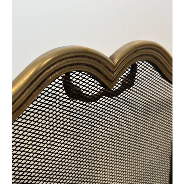 This very beautiful 4 panel neoclassical style fireplace screen is made of brass and grills. This is a French work. Circa...