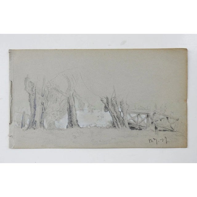 Vintage small pencil drawing on gray paper of rustic wooden bridge over stream with trees. Likely european dated 1913...