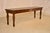 19th century oak bench from England with lovely hand turned legs. The top has lovely graining and is banded , surrounding...