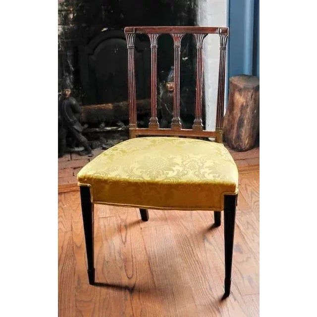 Antique late 18th century American Federal classical mahogany side chair with column form back splats. Yellow silk...