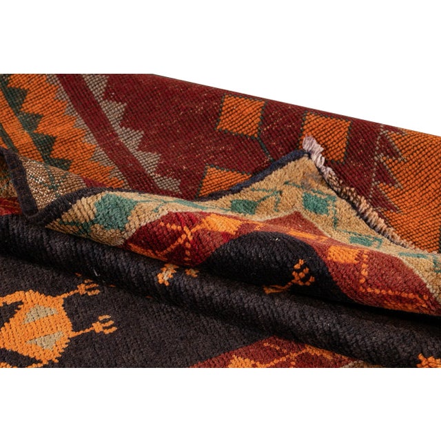 Vintage hand-knotted Kurdish Wool rug with a geometric design. This piece is made of wool and it has a great design and...