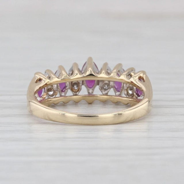 Gemstone Information: - Natural Rubies - Total Carats - 0.63ctw Cut - Marquise Brilliant Color - Red Treatment - Routinely...
