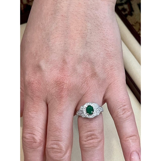 0.80 Carat Oval Cut Emerald and 0.85 Carat Diamond Ring 18 Karat White Gold For Sale - Image 9 of 18