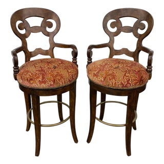 Pair of Century Furniture Carved Wood Swivel Bar Stools With Paisley Upholstery For Sale