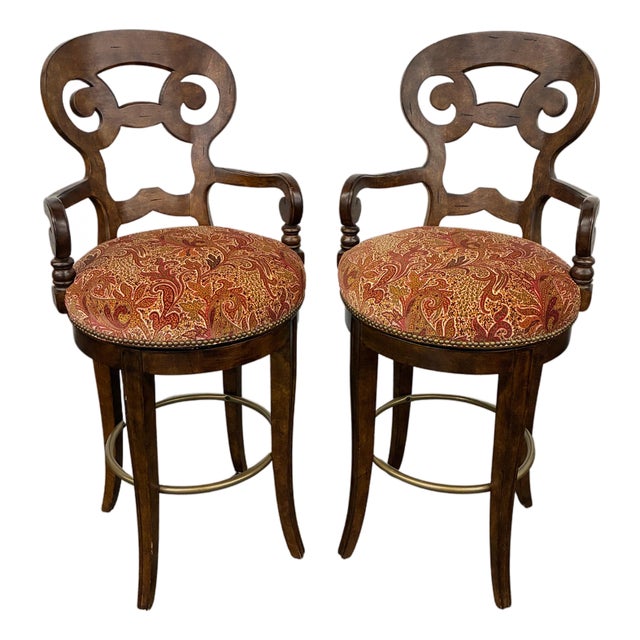 Pair of Century Furniture Carved Wood Swivel Bar Stools With Paisley Upholstery For Sale