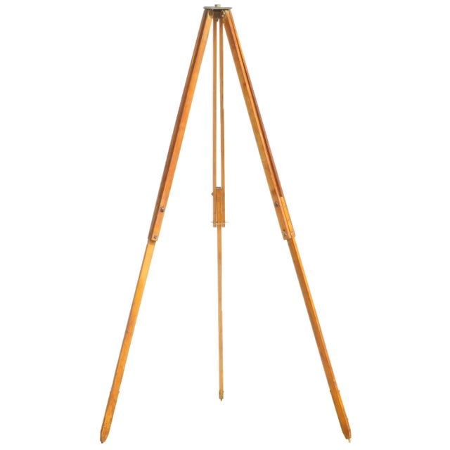 Handsome vintage wood surveying tri-pod with metal leg caps. Perfect on its own as an as-found decorative accent or as the...