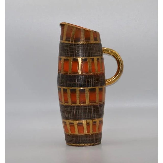 This piece is fantastic with fabulous colors! A great addition to your collection or as a stand alone accent piece. The...