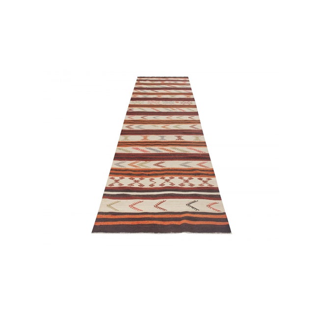 Handwoven vintage kilim rug from Denizli region of Turkey. Approximately 50-60 years old. In very good condition.