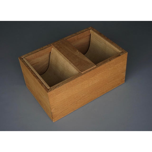 A unusual magazine rack or magazine holder in oak with canvas slung interior. Very minimalist and strict design. The...