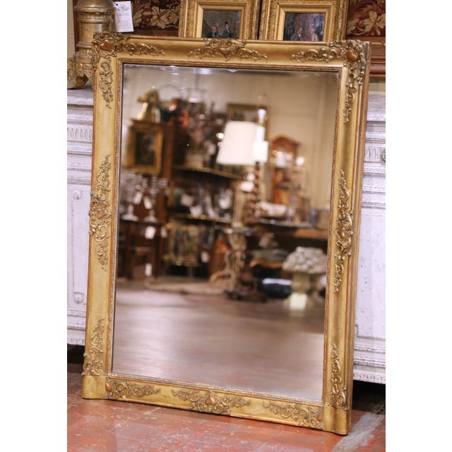 Place this elegant antique French mirror over a mantel or anchor a room with its refined presence. Crafted in France circa...